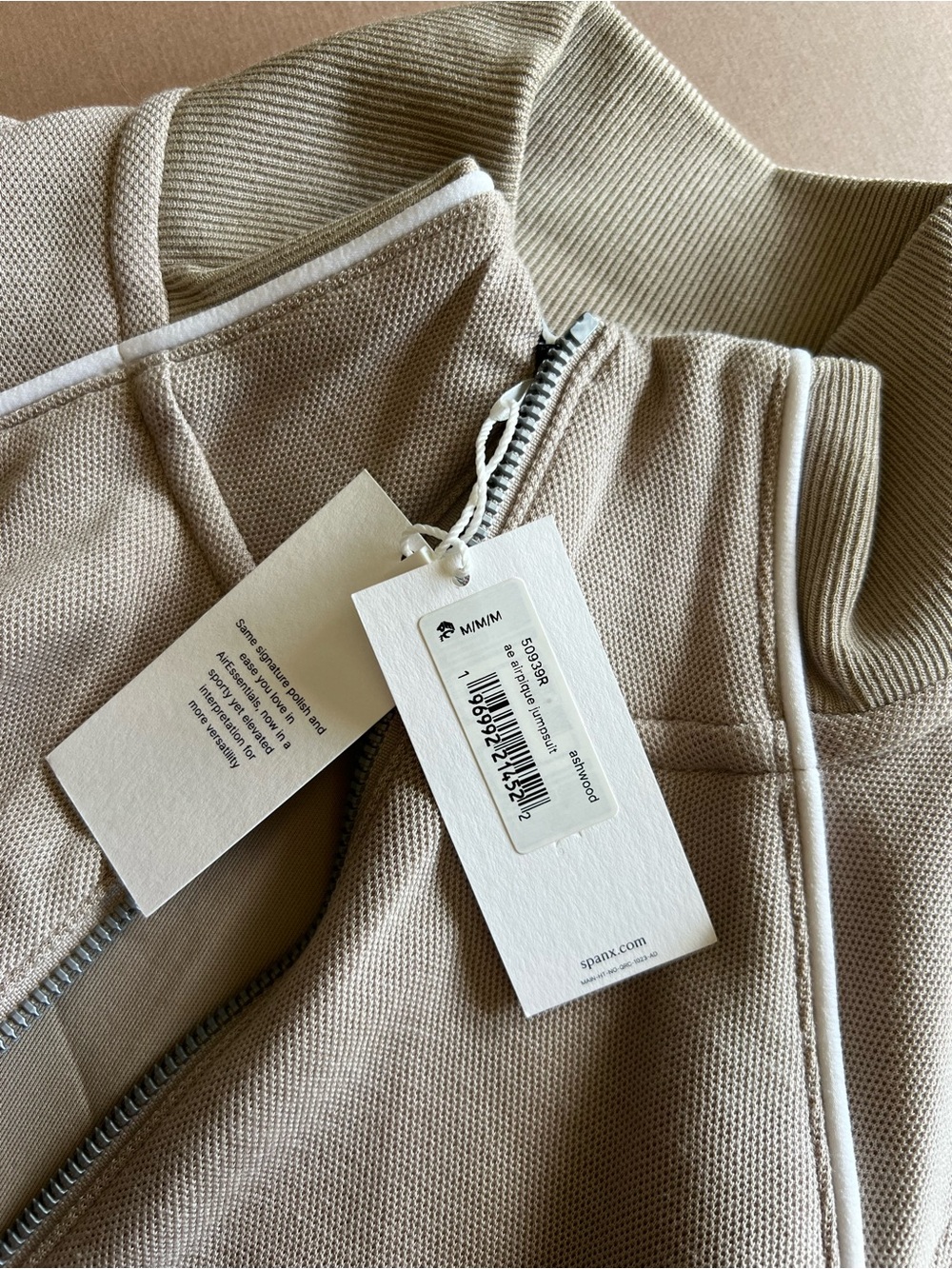 SPANX AirEssentials Pique
Sleeveless Mockneck Jumpsuit in Beige Ashwood - Picture 5 of 9